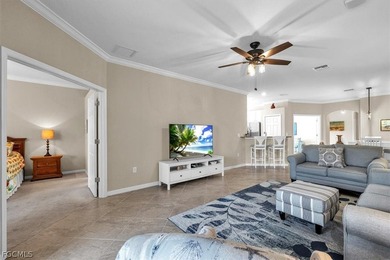 Welcome to this charming villa, formerly a model home, that is on Pelican Preserve Golf Club in Florida - for sale on GolfHomes.com, golf home, golf lot