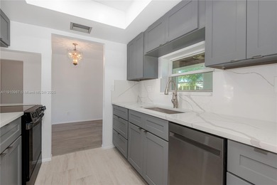 Fabulous Affordable South Florida Home in a lovely quiet 55+ on Leisureville Community Association in Florida - for sale on GolfHomes.com, golf home, golf lot