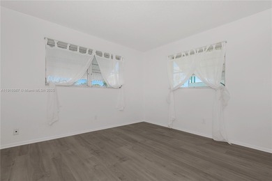 Fabulous Affordable South Florida Home in a lovely quiet 55+ on Leisureville Community Association in Florida - for sale on GolfHomes.com, golf home, golf lot