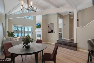 Unbeatable location nestled directly between the tranquil shores on Paupack Hills Golf and Country Club in Pennsylvania - for sale on GolfHomes.com, golf home, golf lot