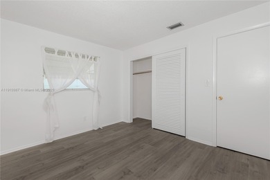 Fabulous Affordable South Florida Home in a lovely quiet 55+ on Leisureville Community Association in Florida - for sale on GolfHomes.com, golf home, golf lot