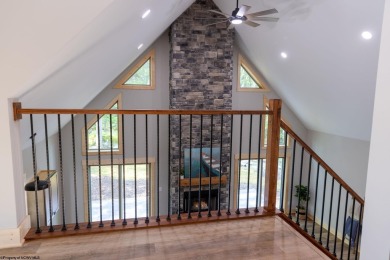 Welcome to *Altitude Adjustment,* a stunning new construction on Alpine Lake Resort in West Virginia - for sale on GolfHomes.com, golf home, golf lot