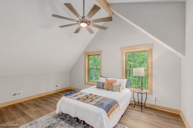 Welcome to *Altitude Adjustment,* a stunning new construction on Alpine Lake Resort in West Virginia - for sale on GolfHomes.com, golf home, golf lot