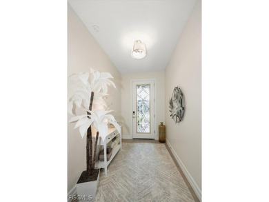 This beautifully appointed 2,000 sq. ft. open-concept residence on Herons Glen Golf and Country Club in Florida - for sale on GolfHomes.com, golf home, golf lot