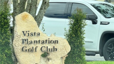 AFFORDABLE LIVING IN DESIRABLE VISTA PLANTATION across from on Vista Plantation Golf Club in Florida - for sale on GolfHomes.com, golf home, golf lot