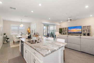 This beautifully appointed 2,000 sq. ft. open-concept residence on Herons Glen Golf and Country Club in Florida - for sale on GolfHomes.com, golf home, golf lot