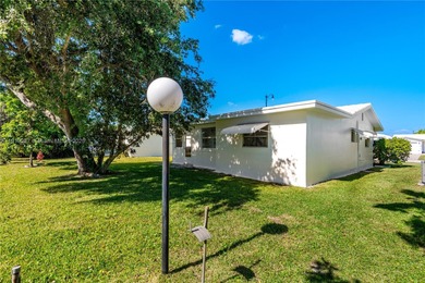 Fabulous Affordable South Florida Home in a lovely quiet 55+ on Leisureville Community Association in Florida - for sale on GolfHomes.com, golf home, golf lot