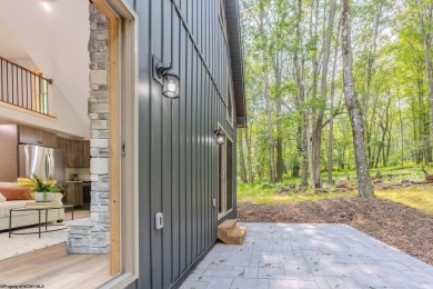 Welcome to *Altitude Adjustment,* a stunning new construction on Alpine Lake Resort in West Virginia - for sale on GolfHomes.com, golf home, golf lot