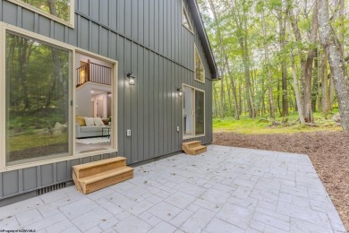 Welcome to *Altitude Adjustment,* a stunning new construction on Alpine Lake Resort in West Virginia - for sale on GolfHomes.com, golf home, golf lot