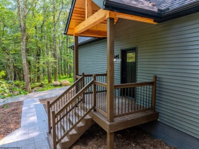 Welcome to *Altitude Adjustment,* a stunning new construction on Alpine Lake Resort in West Virginia - for sale on GolfHomes.com, golf home, golf lot