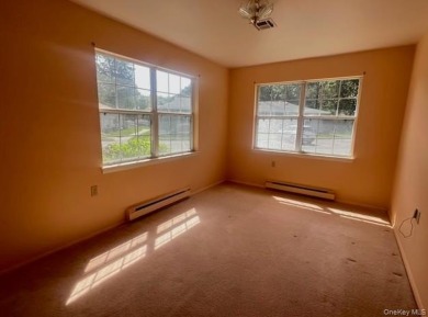Great location. Corner unit Greenbriar Model with open porch and on Leisure Village Golf Course in New York - for sale on GolfHomes.com, golf home, golf lot