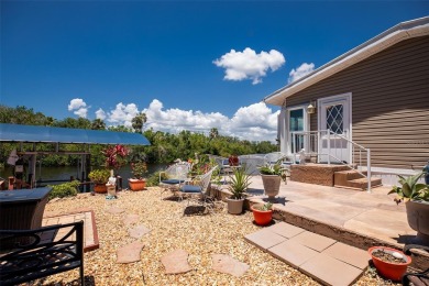 You won't want to miss this WATERFRONT 2 Bedroom, 2 Bathroom, 2 on Twin Isles Country Club in Florida - for sale on GolfHomes.com, golf home, golf lot
