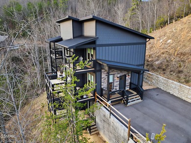 Welcome to this pristine 3 story modern cabin in the highly on Bent Creek Golf Course in Tennessee - for sale on GolfHomes.com, golf home, golf lot