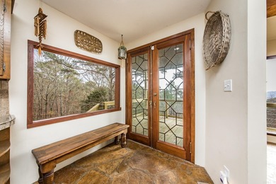 Stunning Mid-Century Mountain Retreat! Nestled among the trees on Mountain Ranch Golf Club in Arkansas - for sale on GolfHomes.com, golf home, golf lot