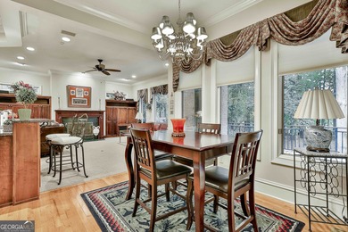 Don't miss this custom built all brick home with a 4 car garage on Whitewater Creek in Georgia - for sale on GolfHomes.com, golf home, golf lot