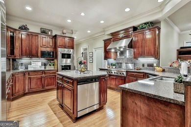 Don't miss this custom built all brick home with a 4 car garage on Whitewater Creek in Georgia - for sale on GolfHomes.com, golf home, golf lot