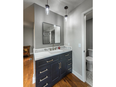 Stunning Mid-Century Mountain Retreat! Nestled among the trees on Mountain Ranch Golf Club in Arkansas - for sale on GolfHomes.com, golf home, golf lot