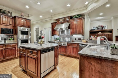 Don't miss this custom built all brick home with a 4 car garage on Whitewater Creek in Georgia - for sale on GolfHomes.com, golf home, golf lot