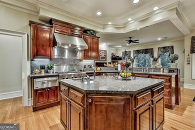 Don't miss this custom built all brick home with a 4 car garage on Whitewater Creek in Georgia - for sale on GolfHomes.com, golf home, golf lot