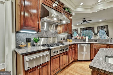 Don't miss this custom built all brick home with a 4 car garage on Whitewater Creek in Georgia - for sale on GolfHomes.com, golf home, golf lot