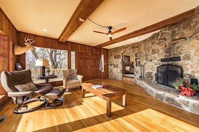 Stunning Mid-Century Mountain Retreat! Nestled among the trees on Mountain Ranch Golf Club in Arkansas - for sale on GolfHomes.com, golf home, golf lot