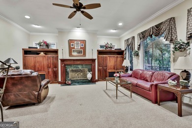Don't miss this custom built all brick home with a 4 car garage on Whitewater Creek in Georgia - for sale on GolfHomes.com, golf home, golf lot