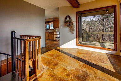 Stunning Mid-Century Mountain Retreat! Nestled among the trees on Mountain Ranch Golf Club in Arkansas - for sale on GolfHomes.com, golf home, golf lot