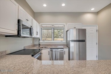 Unbeatable location nestled directly between the tranquil shores on Paupack Hills Golf and Country Club in Pennsylvania - for sale on GolfHomes.com, golf home, golf lot