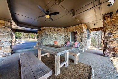 Stunning Mid-Century Mountain Retreat! Nestled among the trees on Mountain Ranch Golf Club in Arkansas - for sale on GolfHomes.com, golf home, golf lot