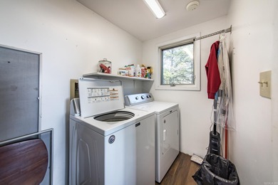 Stunning Mid-Century Mountain Retreat! Nestled among the trees on Mountain Ranch Golf Club in Arkansas - for sale on GolfHomes.com, golf home, golf lot