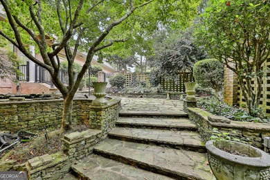 Don't miss this custom built all brick home with a 4 car garage on Whitewater Creek in Georgia - for sale on GolfHomes.com, golf home, golf lot