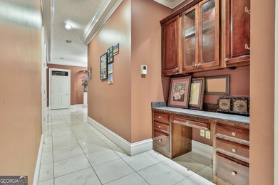 Don't miss this custom built all brick home with a 4 car garage on Whitewater Creek in Georgia - for sale on GolfHomes.com, golf home, golf lot