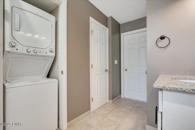Unbeatable location nestled directly between the tranquil shores on Paupack Hills Golf and Country Club in Pennsylvania - for sale on GolfHomes.com, golf home, golf lot