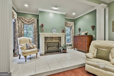 Don't miss this custom built all brick home with a 4 car garage on Whitewater Creek in Georgia - for sale on GolfHomes.com, golf home, golf lot
