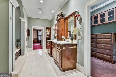 Don't miss this custom built all brick home with a 4 car garage on Whitewater Creek in Georgia - for sale on GolfHomes.com, golf home, golf lot