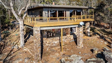 Stunning Mid-Century Mountain Retreat! Nestled among the trees on Mountain Ranch Golf Club in Arkansas - for sale on GolfHomes.com, golf home, golf lot