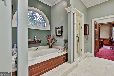 Don't miss this custom built all brick home with a 4 car garage on Whitewater Creek in Georgia - for sale on GolfHomes.com, golf home, golf lot
