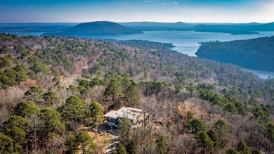 Stunning Mid-Century Mountain Retreat! Nestled among the trees on Mountain Ranch Golf Club in Arkansas - for sale on GolfHomes.com, golf home, golf lot