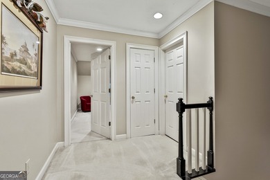 Don't miss this custom built all brick home with a 4 car garage on Whitewater Creek in Georgia - for sale on GolfHomes.com, golf home, golf lot