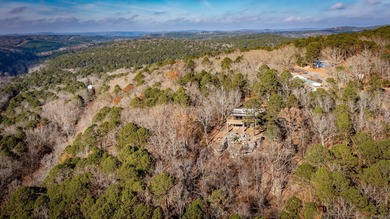Stunning Mid-Century Mountain Retreat! Nestled among the trees on Mountain Ranch Golf Club in Arkansas - for sale on GolfHomes.com, golf home, golf lot