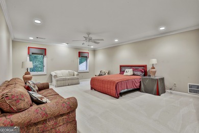 Don't miss this custom built all brick home with a 4 car garage on Whitewater Creek in Georgia - for sale on GolfHomes.com, golf home, golf lot