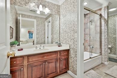 Don't miss this custom built all brick home with a 4 car garage on Whitewater Creek in Georgia - for sale on GolfHomes.com, golf home, golf lot