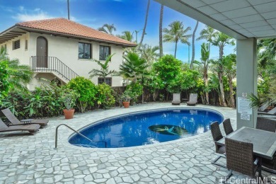 Enjoy breathtaking views from this corner end unit, overlooking on Ala Wai Golf Course in Hawaii - for sale on GolfHomes.com, golf home, golf lot