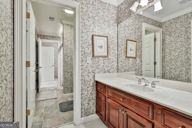Don't miss this custom built all brick home with a 4 car garage on Whitewater Creek in Georgia - for sale on GolfHomes.com, golf home, golf lot