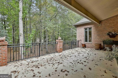 Don't miss this custom built all brick home with a 4 car garage on Whitewater Creek in Georgia - for sale on GolfHomes.com, golf home, golf lot
