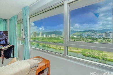 Enjoy breathtaking views from this corner end unit, overlooking on Ala Wai Golf Course in Hawaii - for sale on GolfHomes.com, golf home, golf lot