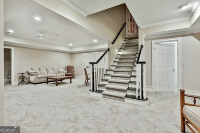 Don't miss this custom built all brick home with a 4 car garage on Whitewater Creek in Georgia - for sale on GolfHomes.com, golf home, golf lot