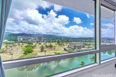 Enjoy breathtaking views from this corner end unit, overlooking on Ala Wai Golf Course in Hawaii - for sale on GolfHomes.com, golf home, golf lot