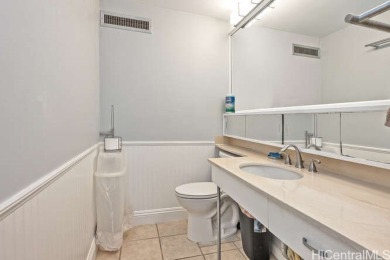Enjoy breathtaking views from this corner end unit, overlooking on Ala Wai Golf Course in Hawaii - for sale on GolfHomes.com, golf home, golf lot