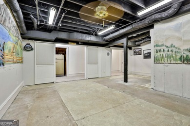 Don't miss this custom built all brick home with a 4 car garage on Whitewater Creek in Georgia - for sale on GolfHomes.com, golf home, golf lot